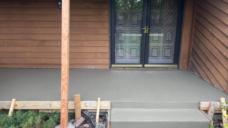New porch cap with steps installed on an Appleton, WI home (photo 1)