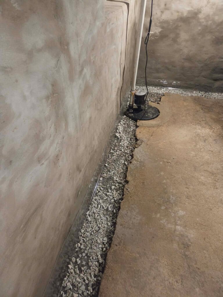 Interior basement waterproofing installation in Appleton, WI (photo 10)