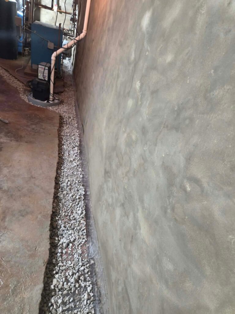 Interior basement waterproofing installation in Appleton, WI (photo 4)