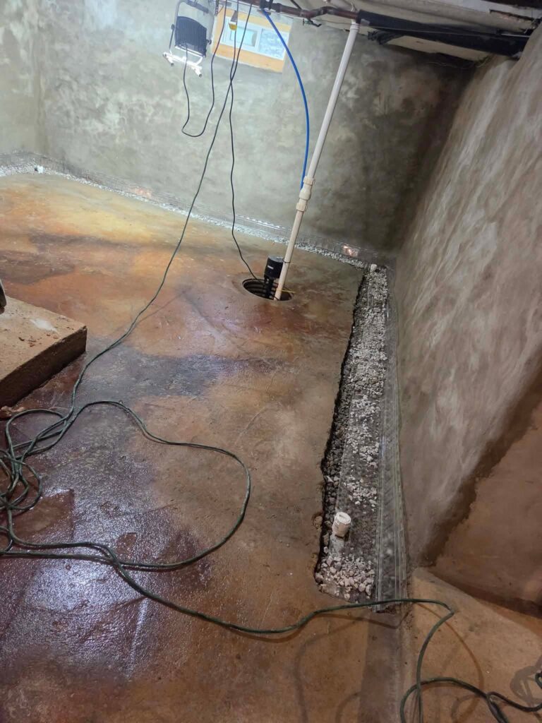 Interior basement waterproofing installation in Appleton, WI (photo 5)