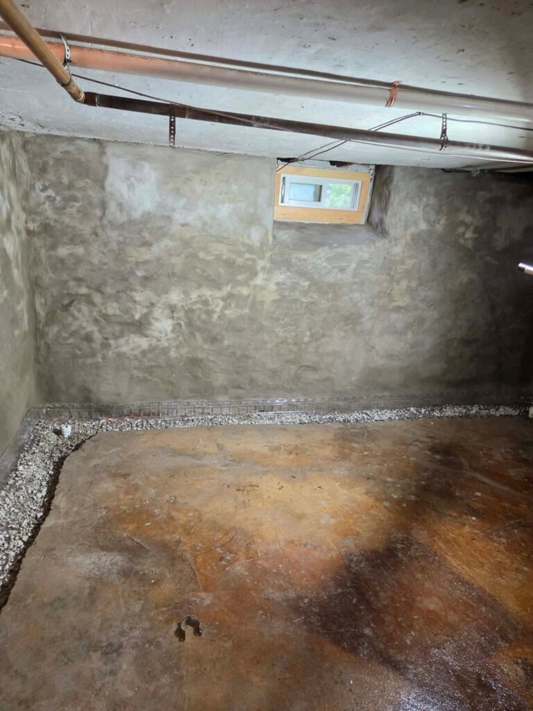Interior basement waterproofing installation in Appleton, WI (photo 8)