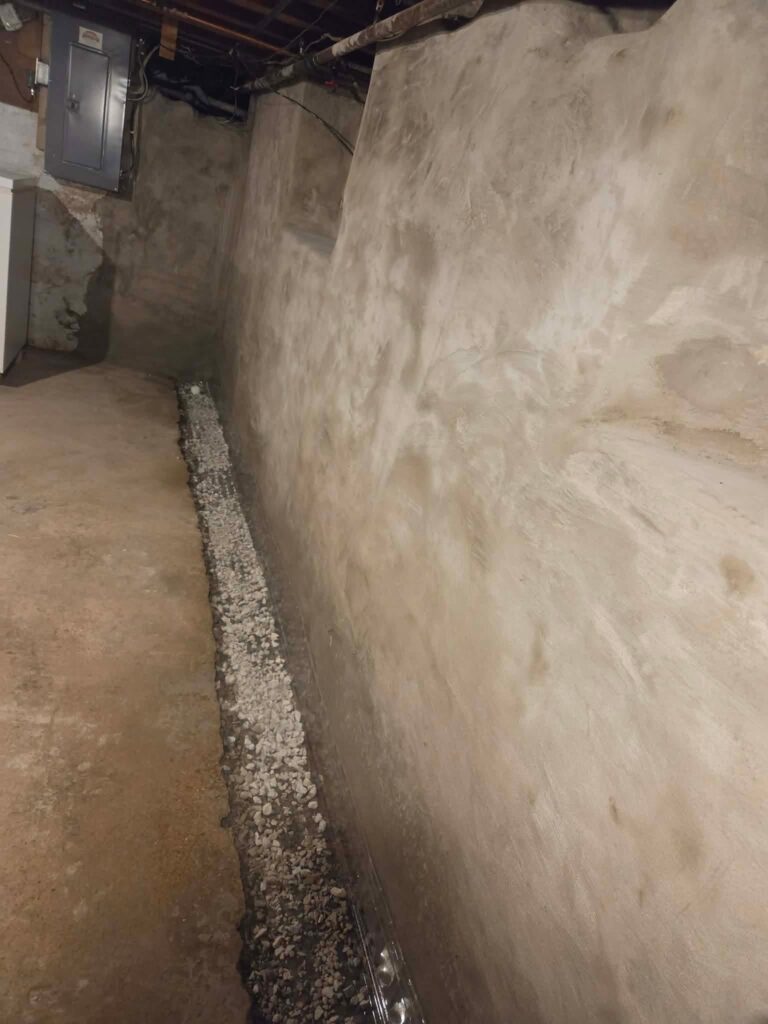 Interior basement waterproofing installation in Appleton, WI (photo 9)
