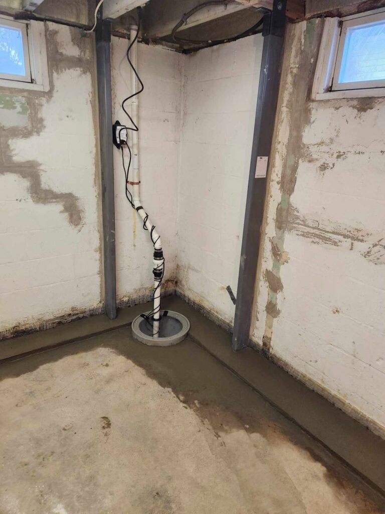 Interior basement waterproofing and foundation repair project in Menasha, WI (photo 15)