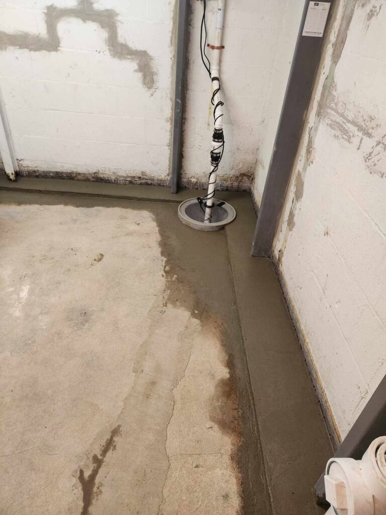Interior basement waterproofing and foundation repair project in Menasha, WI (photo 2)