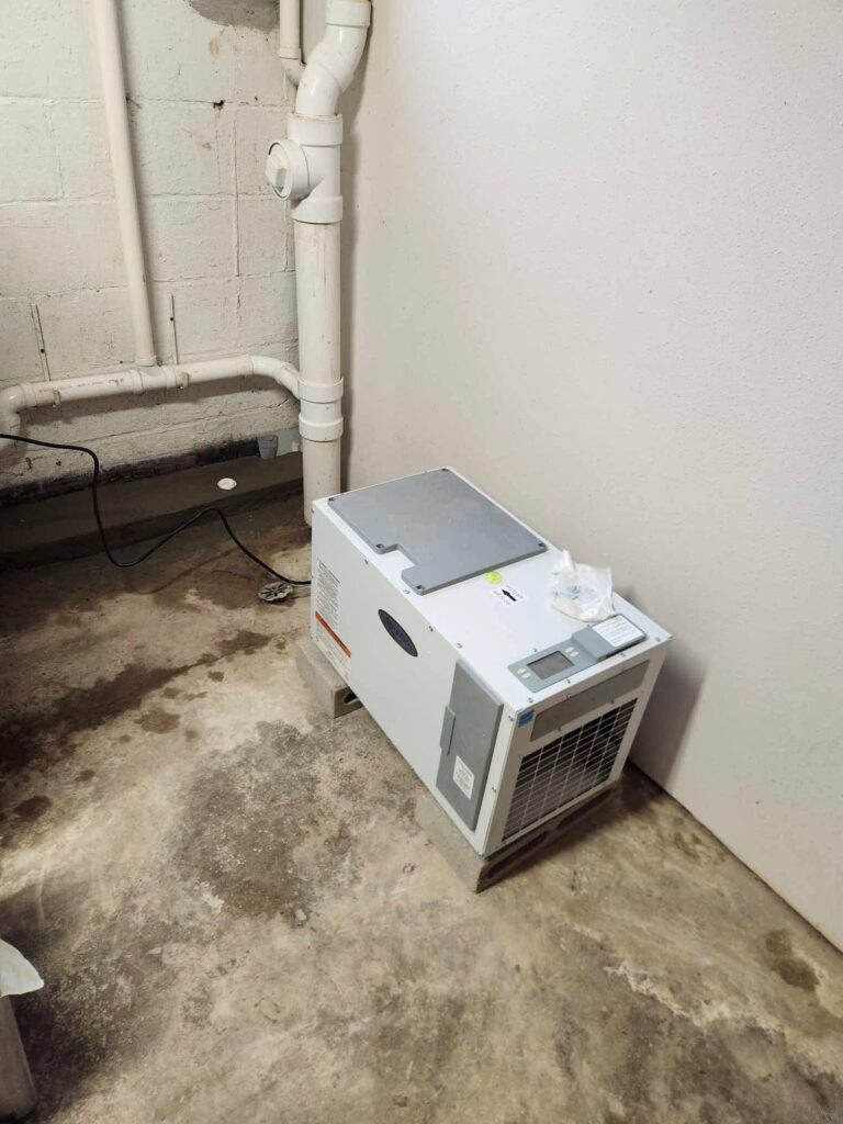 Interior basement waterproofing and foundation repair project in Menasha, WI (photo 4)