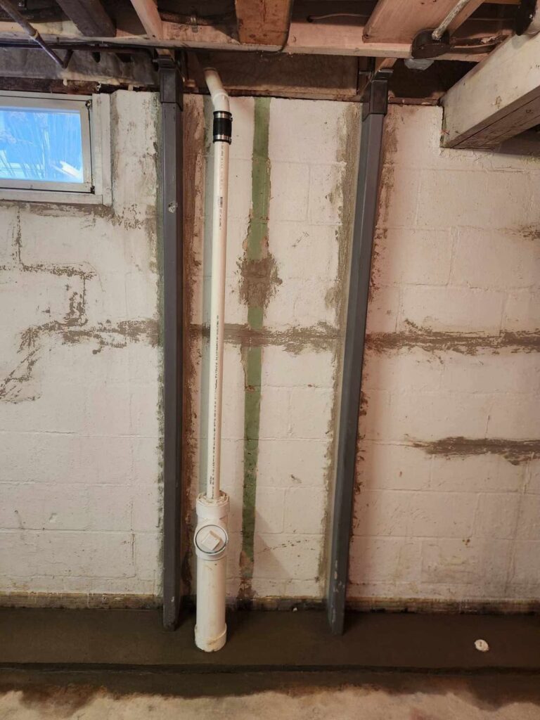 Interior basement waterproofing and foundation repair project in Menasha, WI (photo 5)